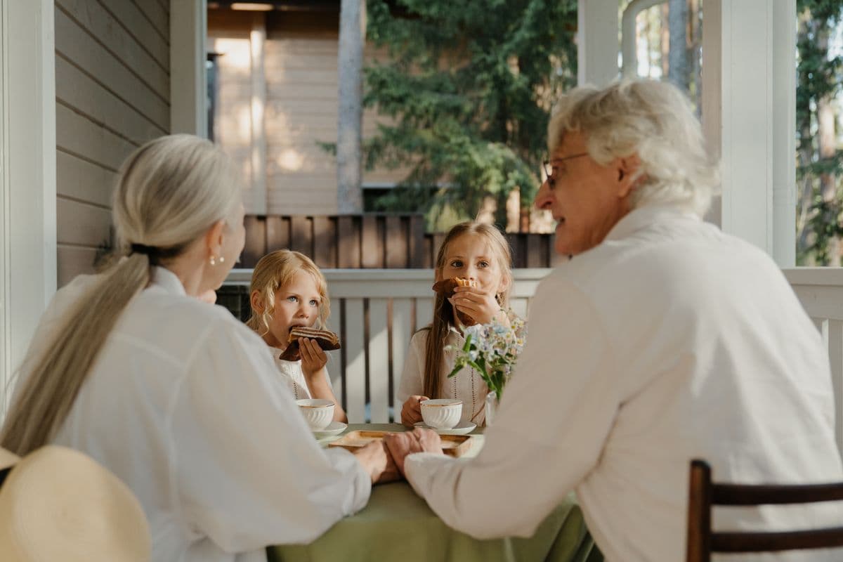 Grandparents sharing a meal with their grandchildren