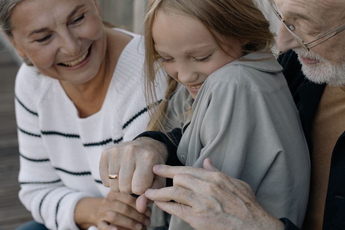 Grandparents enjoying a warm moment with a grandchild